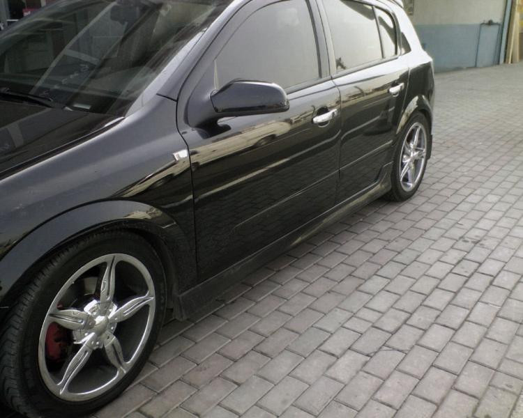Купити Бічні спідниці HB (під фарбування) для Opel Astra H 2004-2013 рр