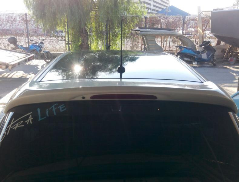 Купити Спойлер HB (під фарбування) для Opel Astra J 2009-2015 рр