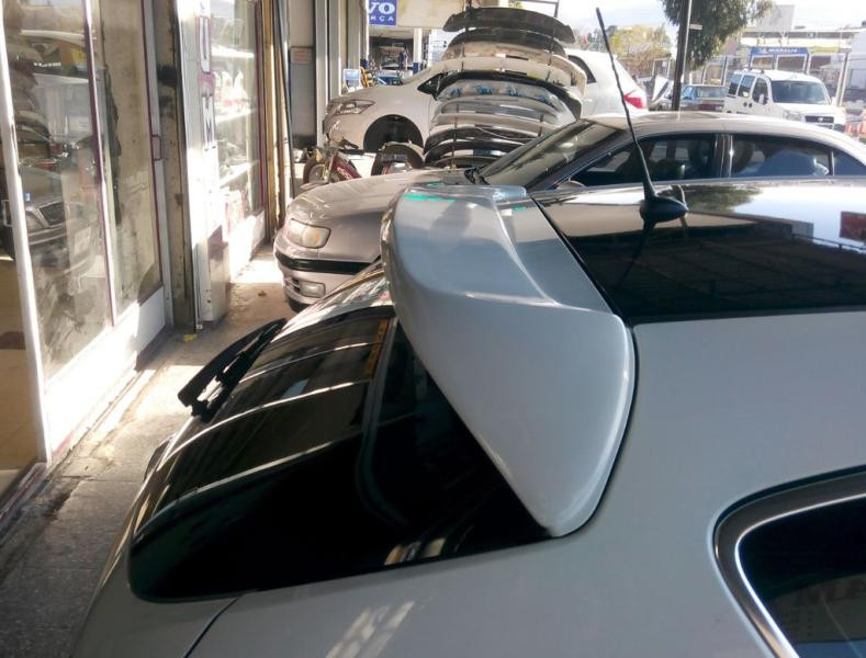 Купити Спойлер HB (під фарбування) для Opel Astra J 2009-2015 рр