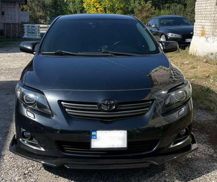 Купить Накладка на передний бампер (под покраску) для Toyota Corolla 2007-2013 гг