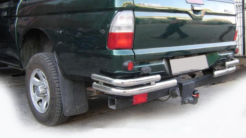 Купить Задние углы AK003-Double (2 шт., нерж) для Mitsubishi L200 1996-2006 гг