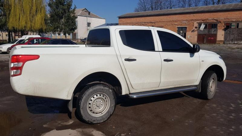 Купить Боковые пороги Premium (2 шт., нерж.) Ø60 для Mitsubishi L200 2015-2024 гг