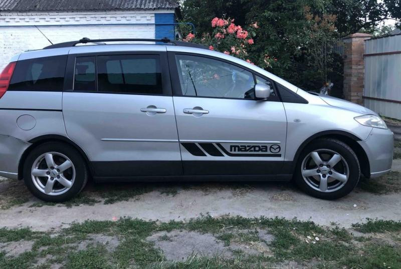 Купити Накладки на арки (4 шт, чорні) 2005-2008, Металеві для Mazda 5 рр