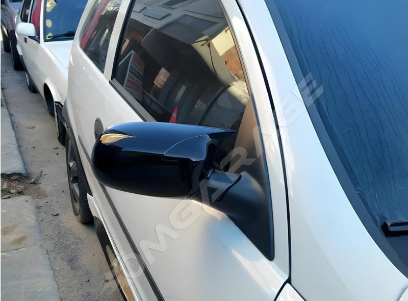 Купити Накладки на дзеркала BMW-Style (2 шт) для Opel Corsa C 2000- рр