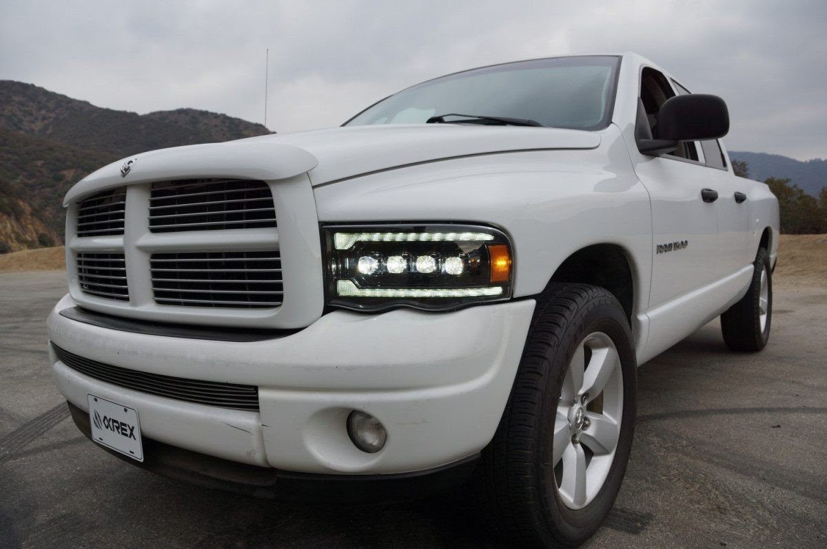 Купити Передні фари Dodge Ram 1500 Classic 2002-2005 LED NOVA серія чорні AlphaRex AHL-DR02-N-B