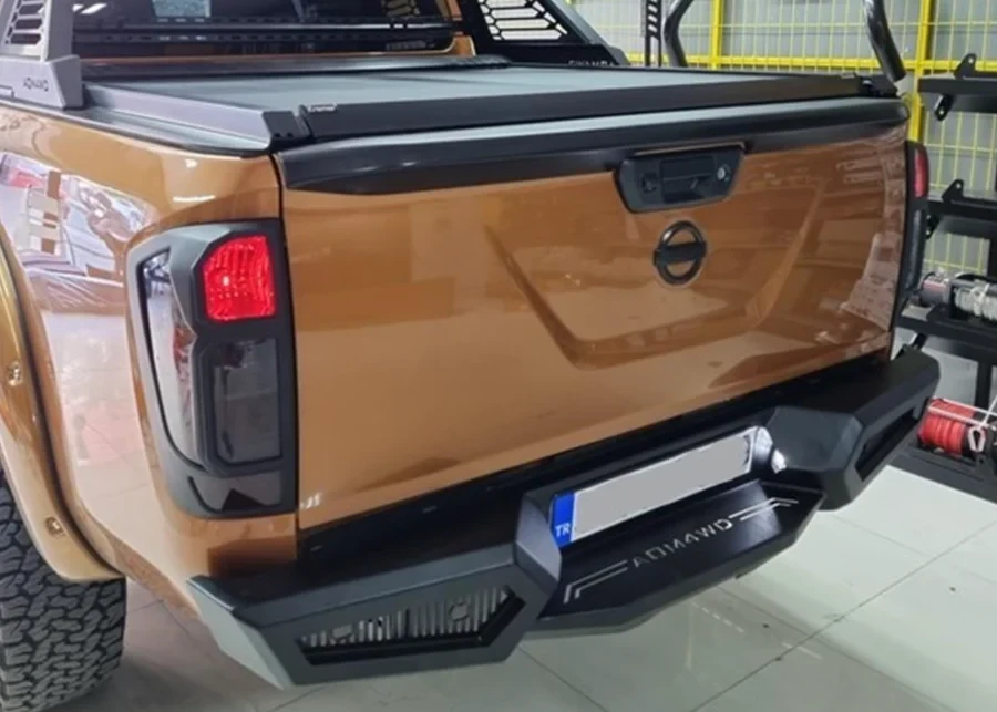 Купити Задній бампер для Nissan Navara 2010-2025 AQM-M20