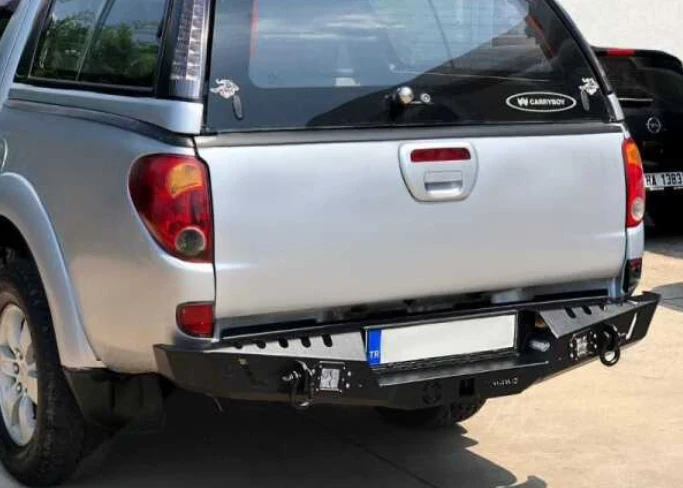 Купити Задній бампер для Mitsubishi L200 2007+ AQM-S20