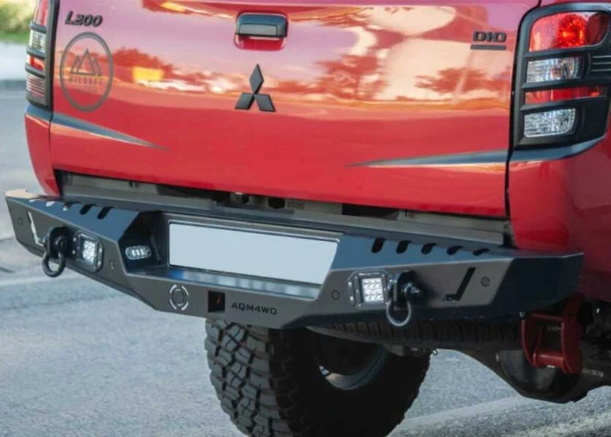 Купити Задній бампер для Mitsubishi L200 2007+ AQM-S20