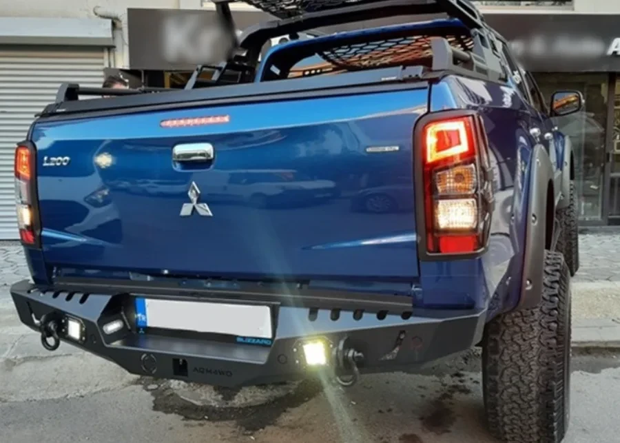 Купити Задній бампер для Mitsubishi L200 2007+ AQM-S20