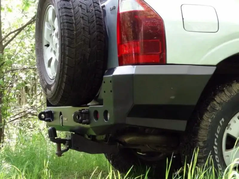 Купити Задній бампер Mitsubishi Pajero 99-06 коротка колісна база F4X4