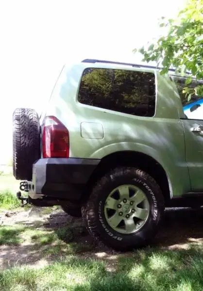 Купити Задній бампер Mitsubishi Pajero 99-06 коротка колісна база F4X4