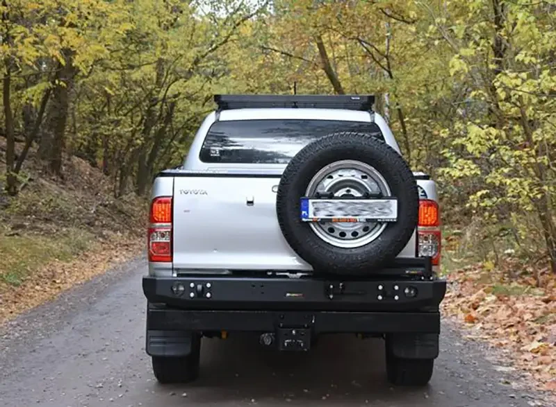 Купити Задній бампер під тримачі колеса та каністри Toyota Hilux 04-15 F4X4