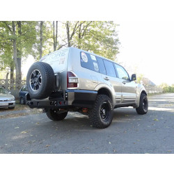 Купити Задній бампер Mitsubishi Pajero 99-06 довга колісна база F4X4