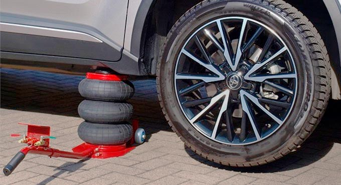 Подкатной пневматический домкрат купить в Украине дешево