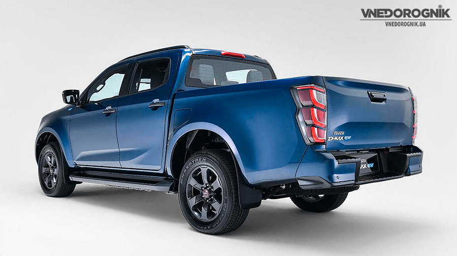 Side view of the 2025 Isuzu D-Max EV all-wheel-drive electric pickup truck, showing the proportions of the body