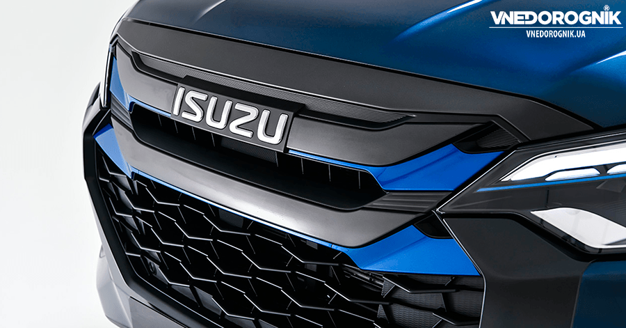 Close-up of the closed radiator grille and EV logo on the new 2025 Isuzu D-Max electric pickup truck