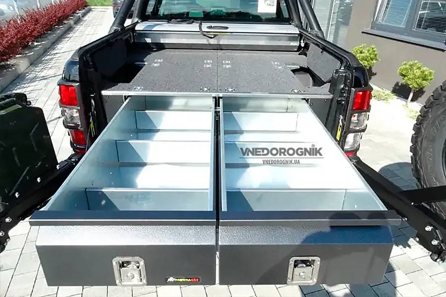 Two installed drawers in a 4x4 pickup bed showing efficient space use and readiness for gear transport.