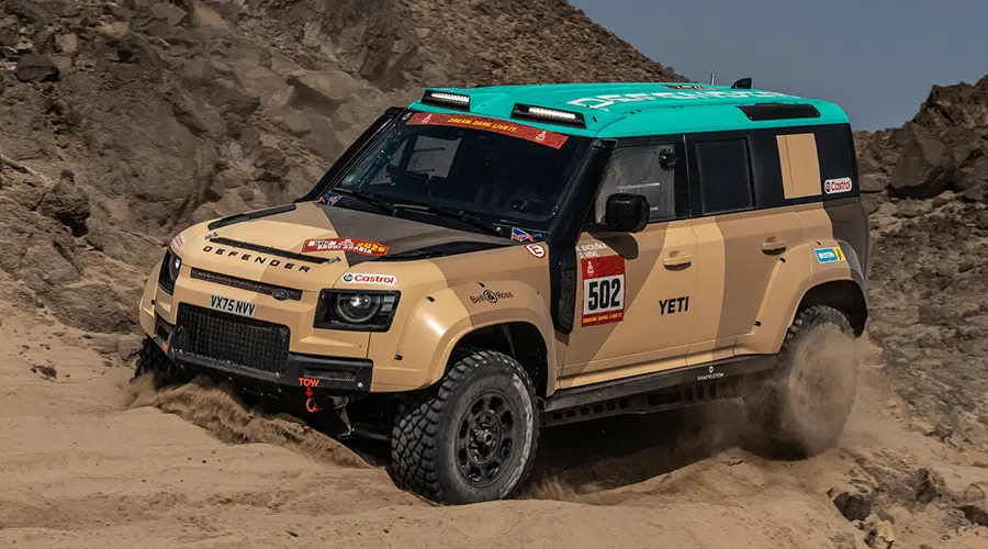 Sara Price's case on the Defender proves that factory suspension cannot withstand shock loads in the desert, so professional tuning is necessary for survival.